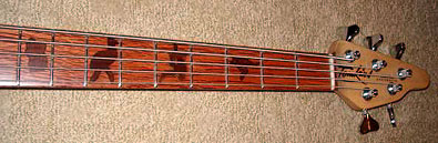5 string bass with Australian animal designs on neck