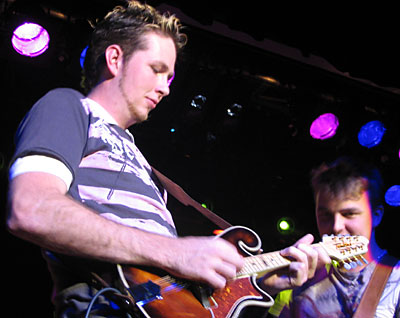 Josh Grundy (on Tomkins mandolin) and Travis Collins