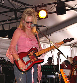 Beccy Cole on guitar