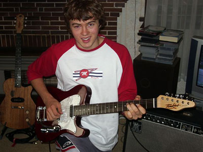 Smokin' Joe Robinson playing his Tomkins guitar